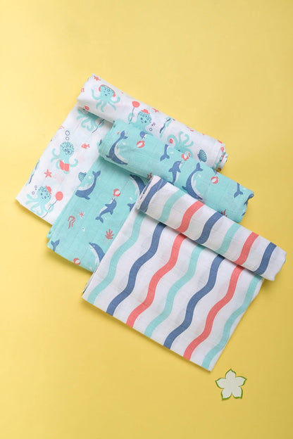 Kaarpas ‘Ocean Dive’ organic muslin cotton swaddle 3 pack: Dolphin, Octopus and Dreamy Waves - Tinycubs - 