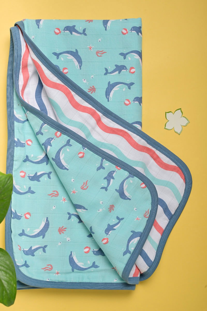Organic muslin baby blanket with dolphin design
